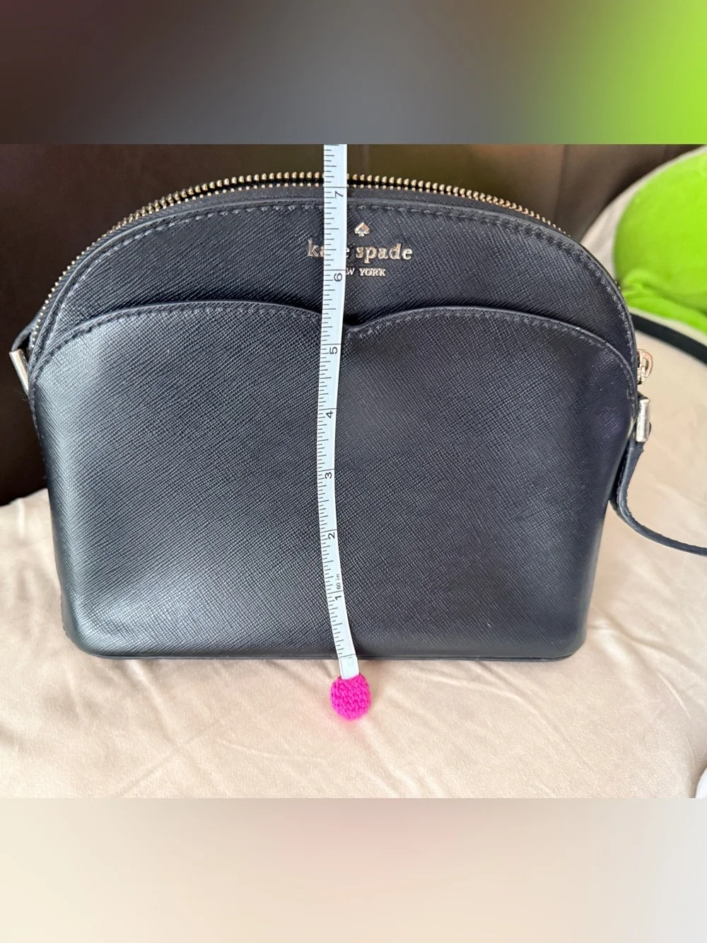 Kate Spade New York Payton Dome Crossbody in black saffiano leather.
